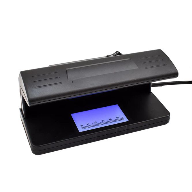 Détecteur de faux billets à lumière UV